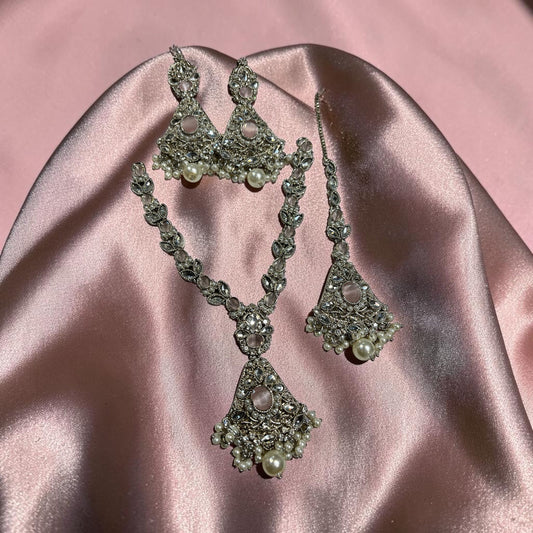 Silver-tone V-neck necklace set with matching earrings and tikka by Zeywar