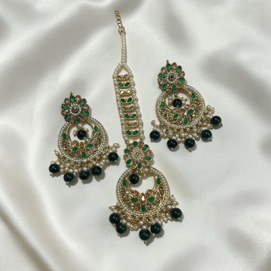Stylish kundan earring with tika